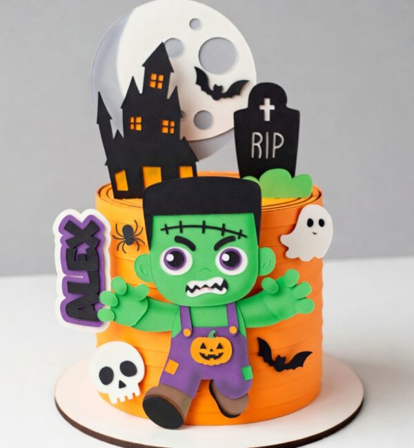 topo-de-bolo-halloween-frankenstein-infantil.webp Topo de Bolo Halloween Frankenstein infantil com castelo assombrado, lua cheia, morcegos, fantasma, caveira e nome Alex.
